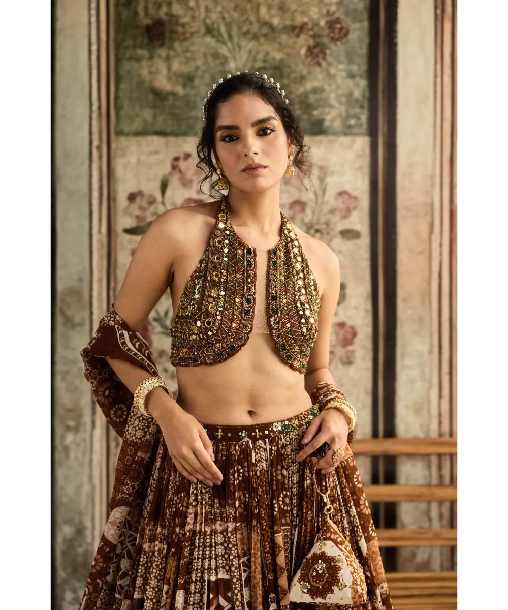 DIYARAJVVIR- Caramel Embroidered Halter Blouse with Printed Lehenga Set